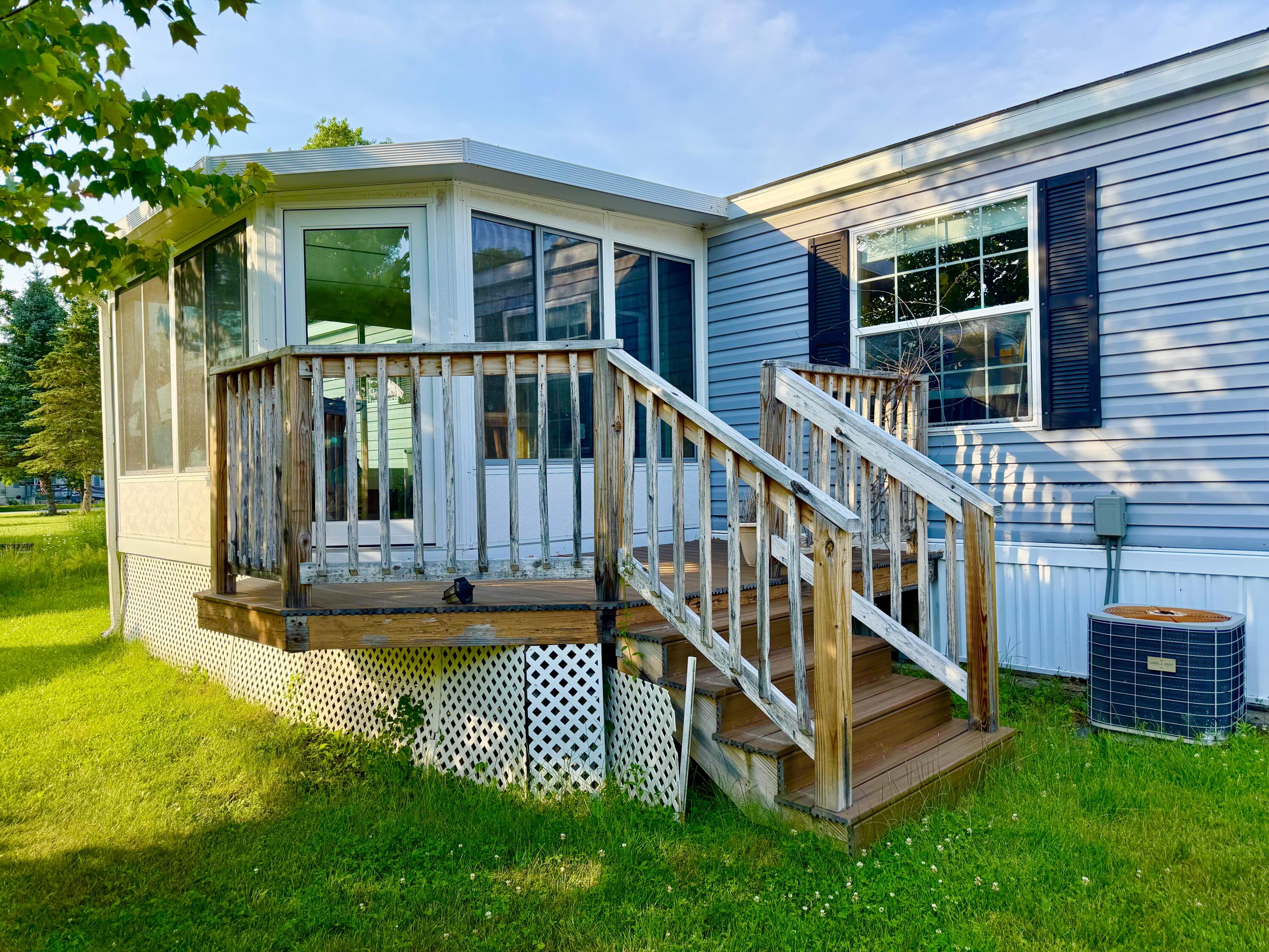 122 Eagle Ridge Road Brewer, ME 04412 - Photo 4 of 74 Deck & Entrance to Sunroom