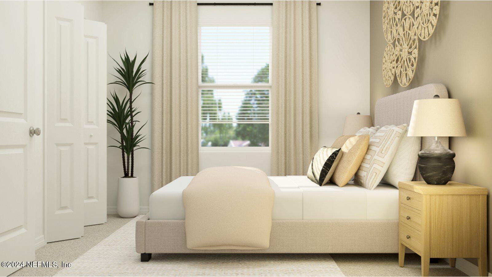 1427 Eddy Road Jacksonville, FL 32211 - Photo 11 of 19 a bedroom with a bed and a window