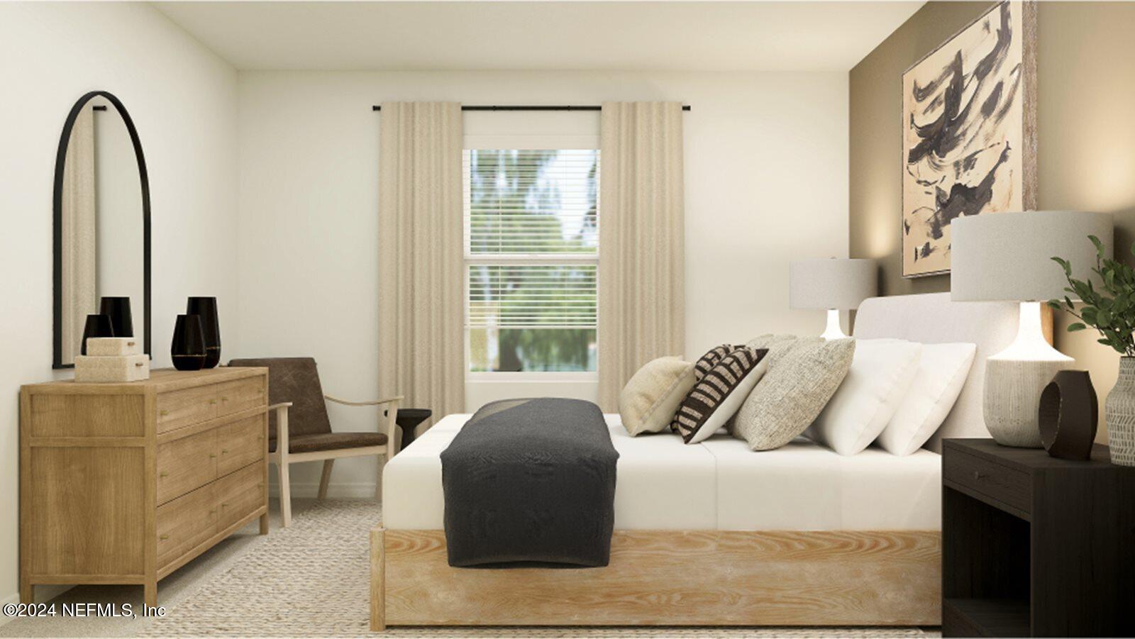 1427 Eddy Road Jacksonville, FL 32211 - Photo 17 of 19 a bedroom with a bed and a large window