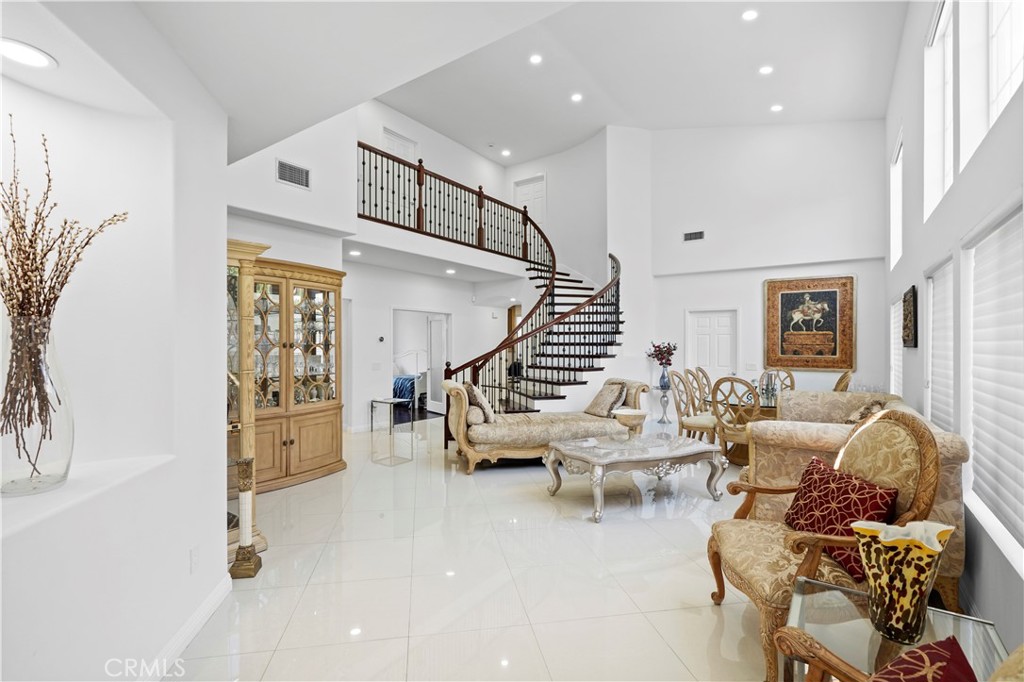 20621 Pesaro Way Porter Ranch, CA 91326 - Photo 3 of 45 a living room with furniture and wooden floor