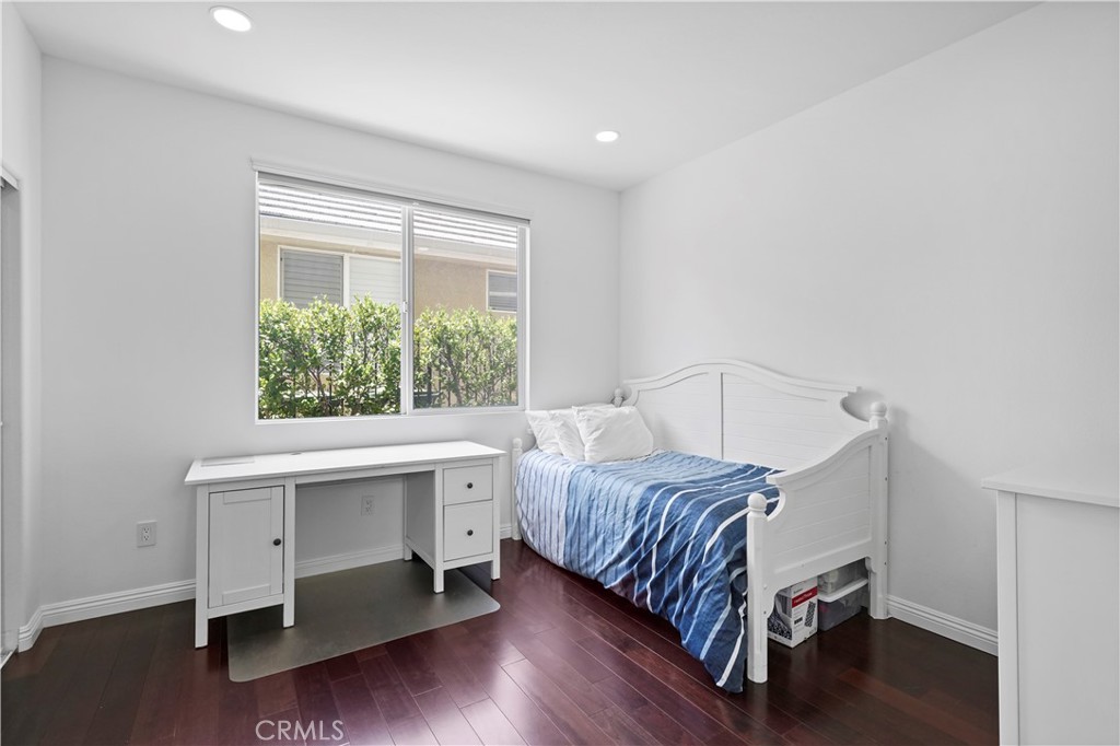 20621 Pesaro Way Porter Ranch, CA 91326 - Photo 33 of 45 a bed room with a bed and a window