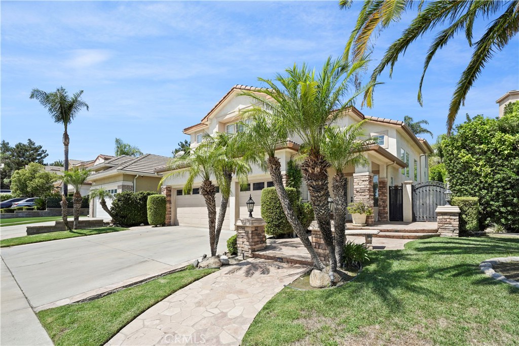 20621 Pesaro Way Porter Ranch, CA 91326 - Photo 44 of 45 a view of a yard with palm trees