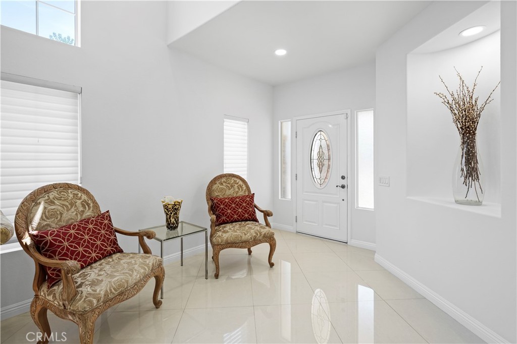 20621 Pesaro Way Porter Ranch, CA 91326 - Photo 7 of 45 a living room with furniture and a window