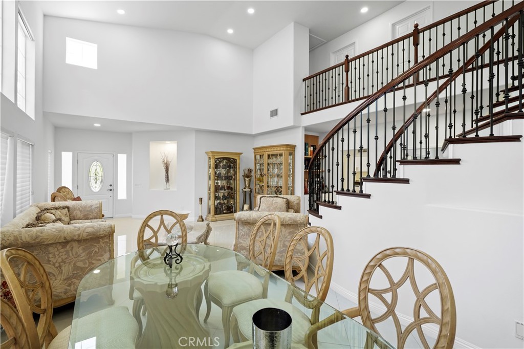 20621 Pesaro Way Porter Ranch, CA 91326 - Photo 9 of 45 a living room with furniture and wooden floor