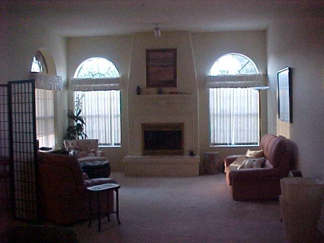 7955 East Chaparral Road, Unit 84 Scottsdale, AZ 85250 - Photo 2 of 6 LIVING ROOM WITH FIREPLACE