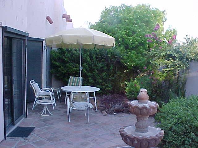 7955 East Chaparral Road, Unit 84 Scottsdale, AZ 85250 - Photo 5 of 6 LARGE TILED PATIO WITH FOUNTAIN