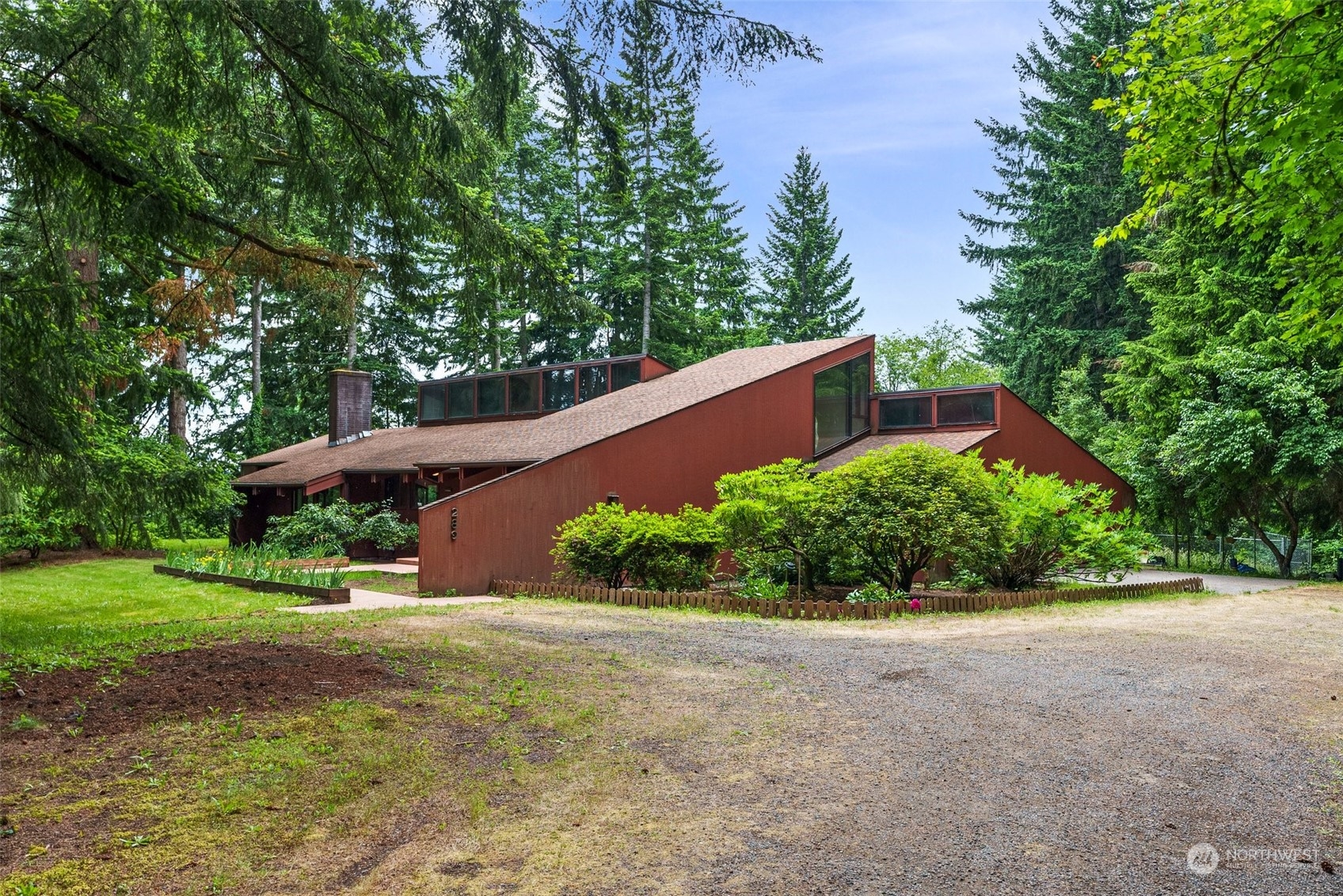 289 Kennicott Road Chehalis, WA 98532 - Photo 26 of 40 a front view of a house with a yard and a garage