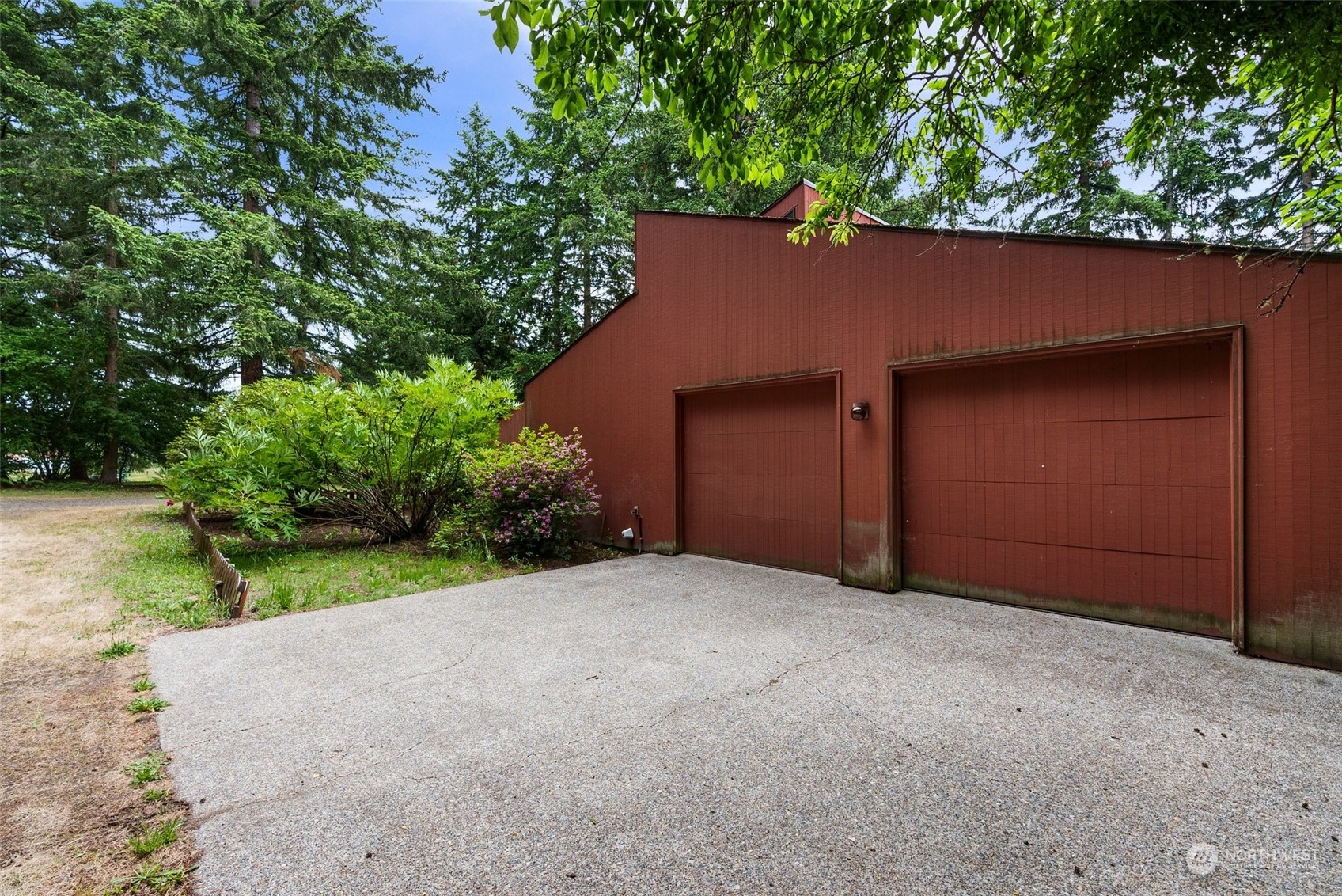 289 Kennicott Road Chehalis, WA 98532 - Photo 31 of 40 a house with lots of trees in the background