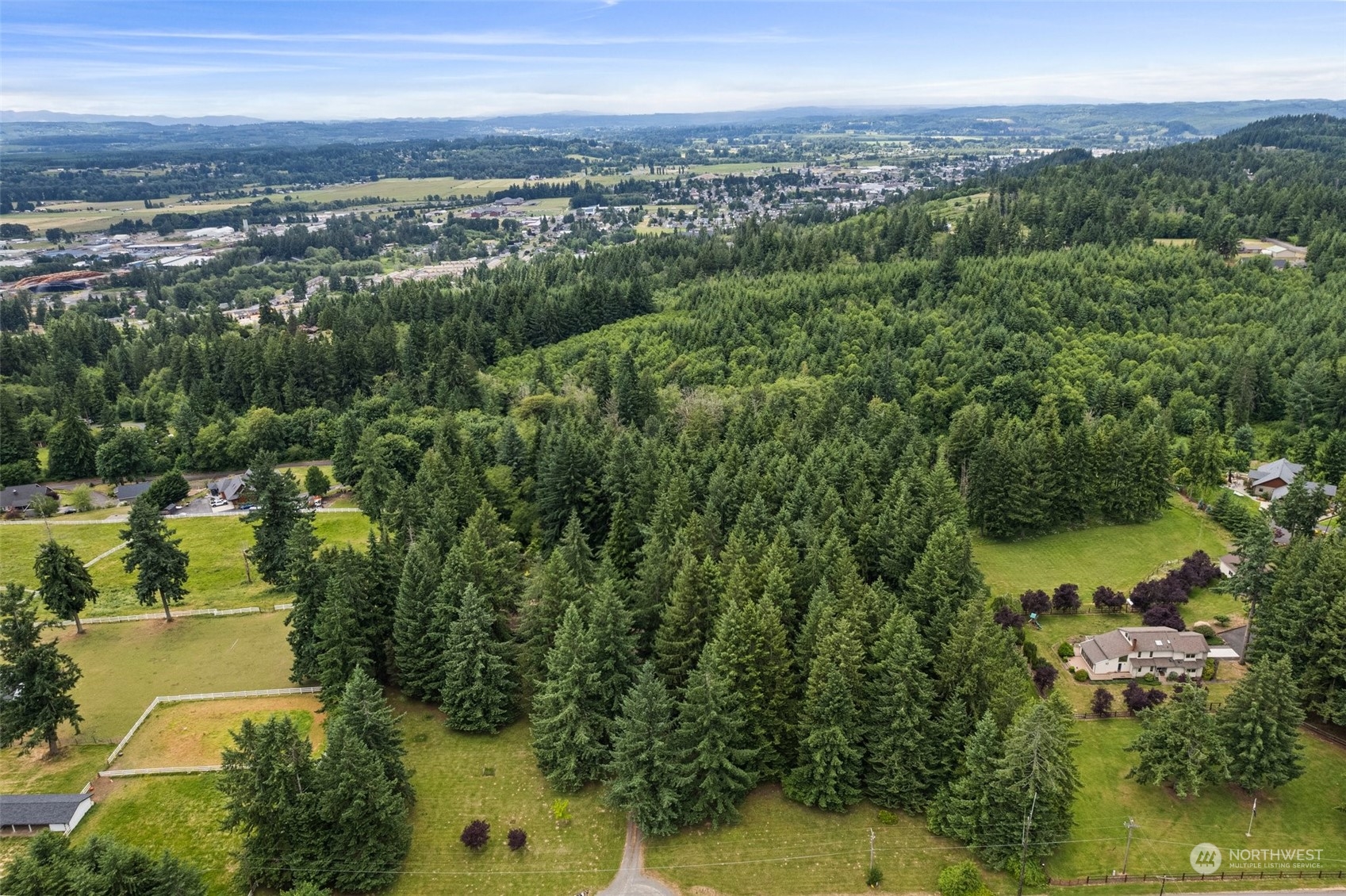 289 Kennicott Road Chehalis, WA 98532 - Photo 34 of 40 a view of a lake with a city