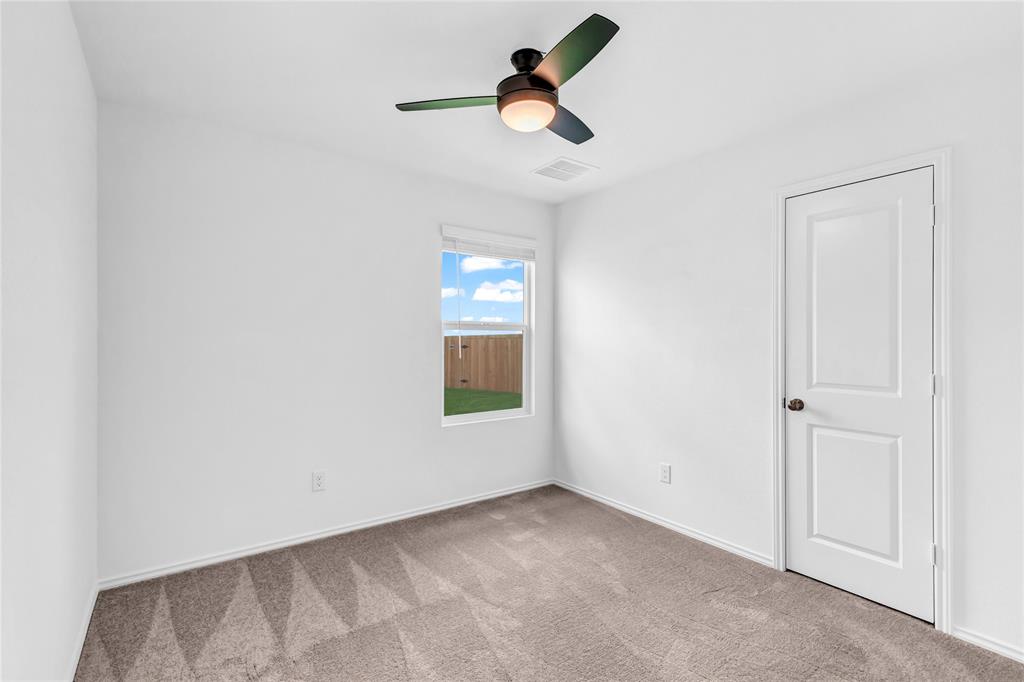 516 Rancho Del Cielo Loop Jarrell, TX 76537 - Photo 26 of 33 a view of empty room with window