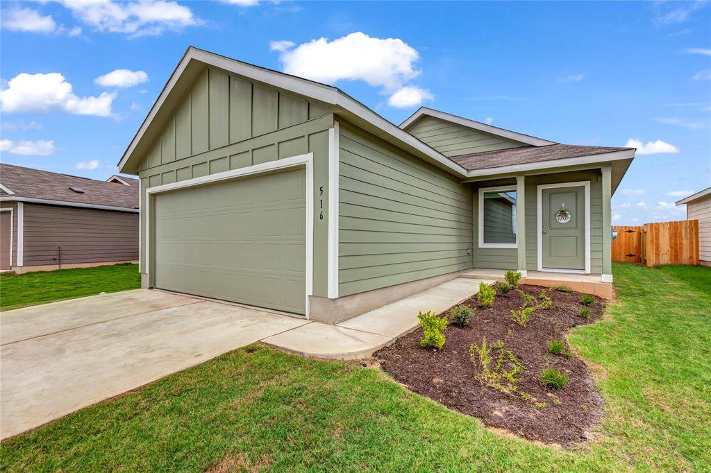 516 Rancho Del Cielo Loop Jarrell, TX 76537 - Photo 4 of 33 a view of backyard of the house