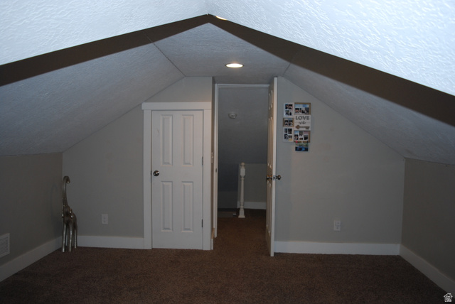 116 North 3rd Street Tooele, UT 84074 - Photo 26 of 45 Sloped ceiling with recessed lighting, paneled doors, and wall-to-wall carpeting