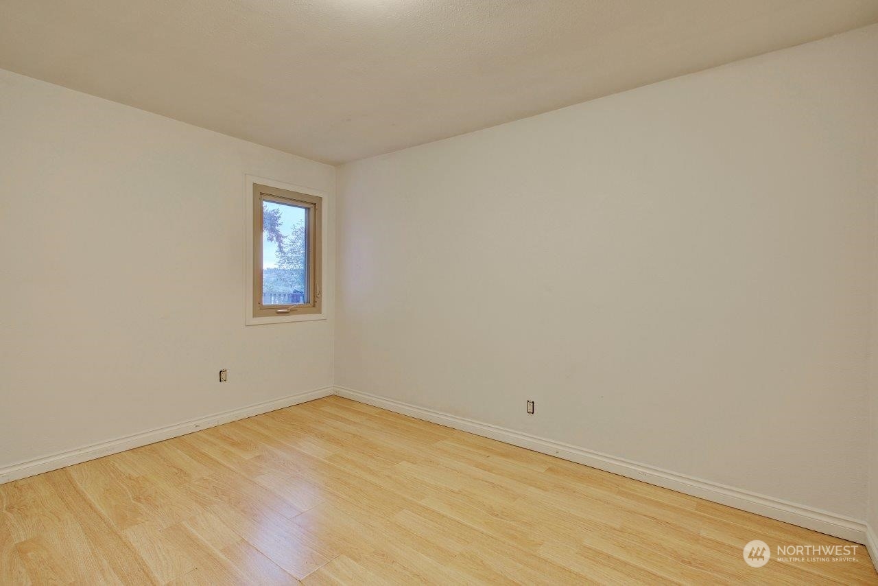 3906 South Pilgrim Street Seattle, WA 98118 - Photo 18 of 29 a view of a room that has a window