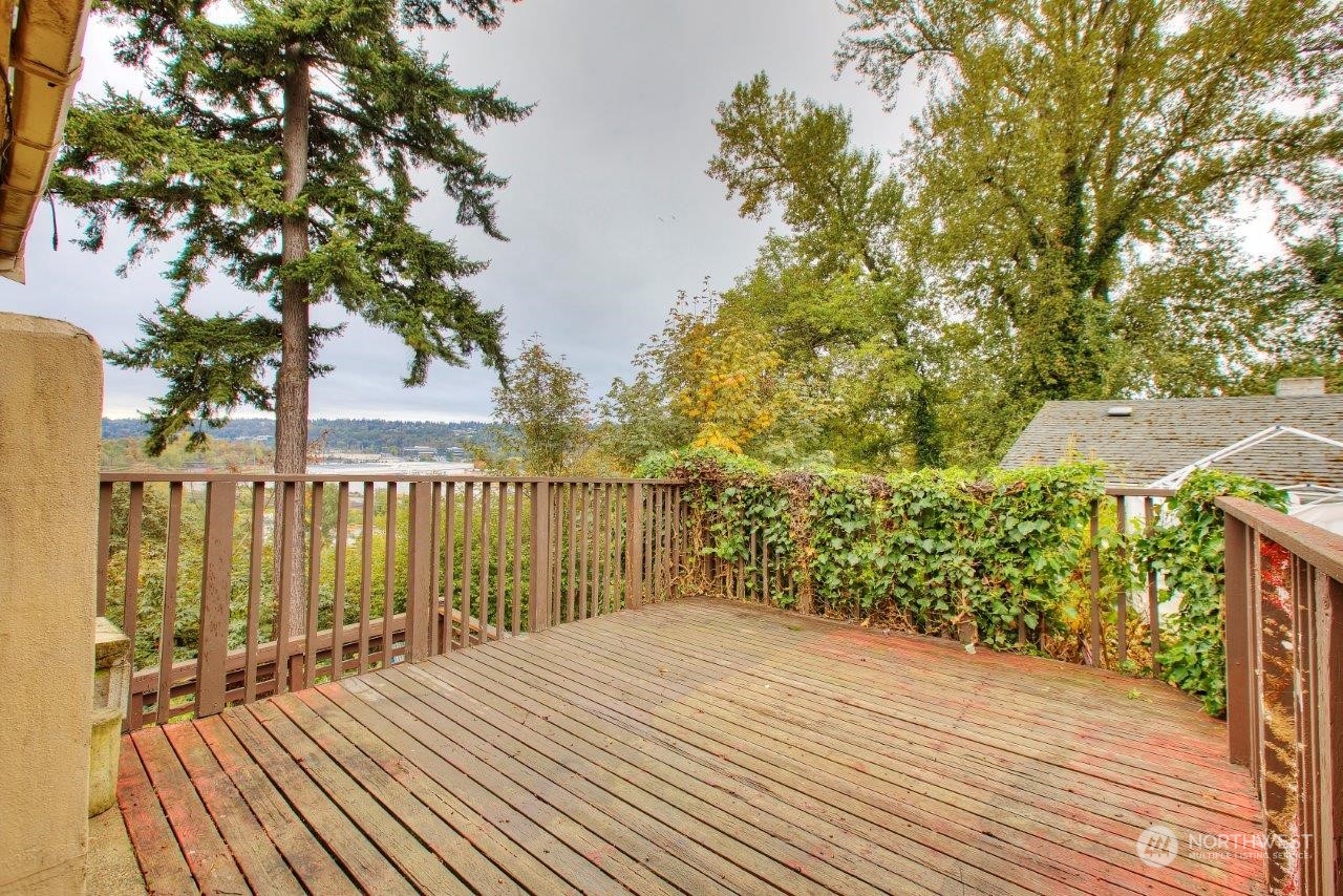 3906 South Pilgrim Street Seattle, WA 98118 - Photo 28 of 29 a view of outdoor space with deck and garden