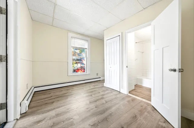 a view of an empty room and window