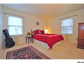 601 Trail Ridge Road Matthews, NC 28105 - Photo 12 of 16 a bedroom with a bed a table and chair