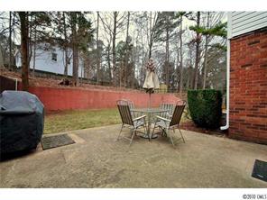 601 Trail Ridge Road Matthews, NC 28105 - Photo 15 of 16 a patio with table and chairs
