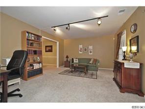 601 Trail Ridge Road Matthews, NC 28105 - Photo 8 of 16 a living room with furniture and a flat screen tv