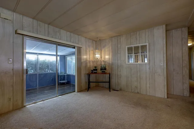 a view of a livingroom with a bathroom