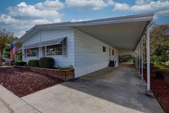a front view of a house with garage