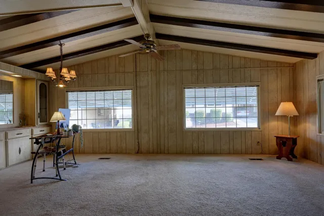 a room with furniture and a window