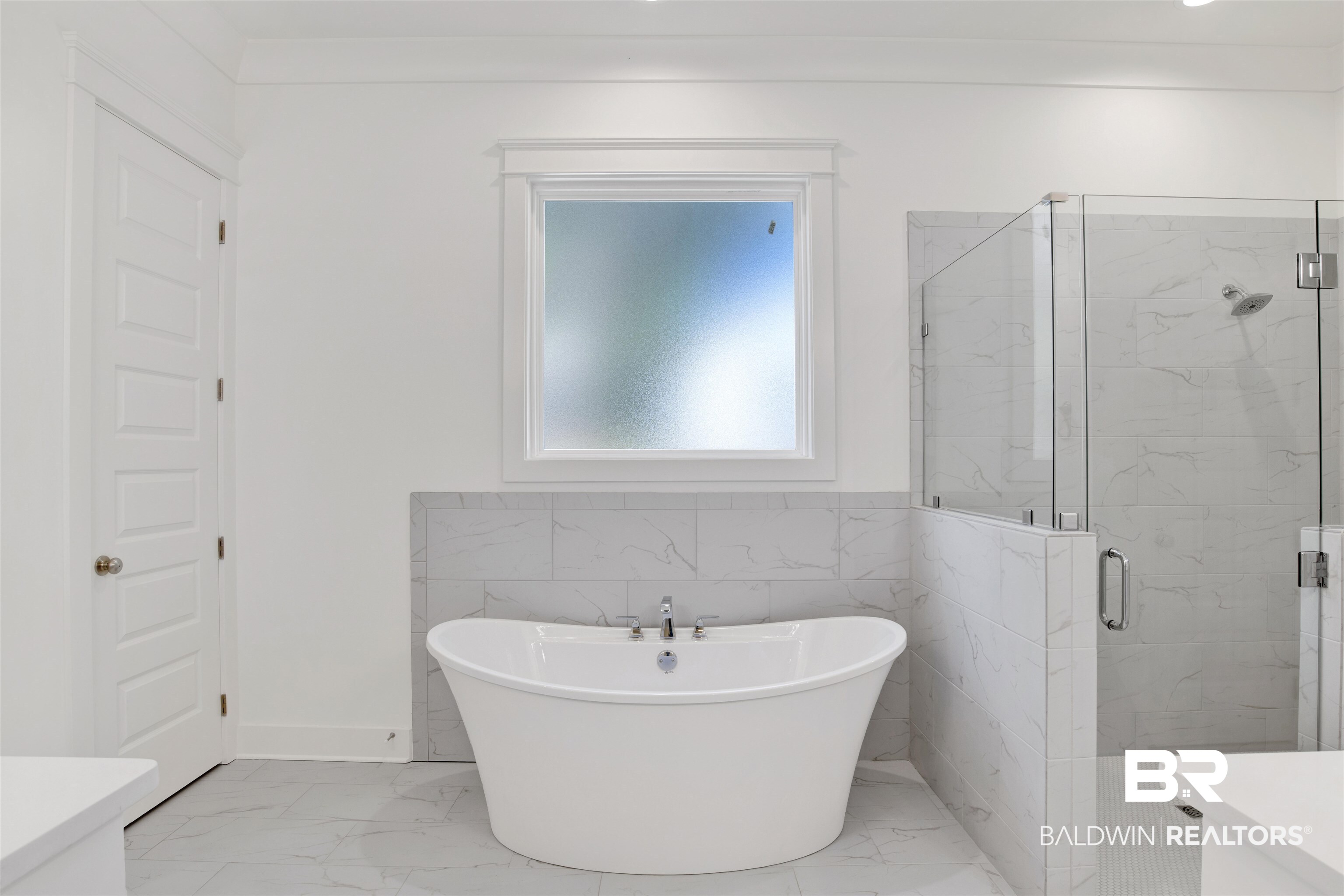 5 Long Leaf Circle Fairhope, AL 36532 - Photo 23 of 44 Bathroom featuring vanity, tile walls, and shower with separate bathtub