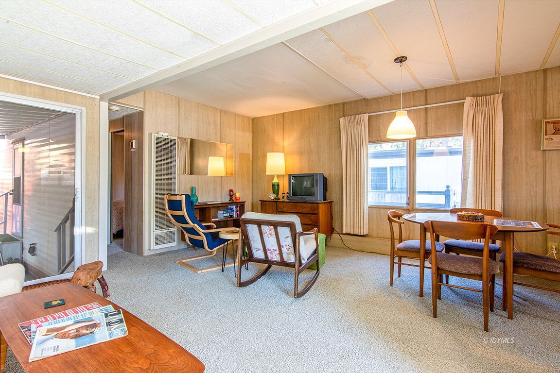 52901 Pine Cove Road, Unit 5 Idyllwild, CA 92549 - Photo 11 of 35 a view of a livingroom with furniture and window