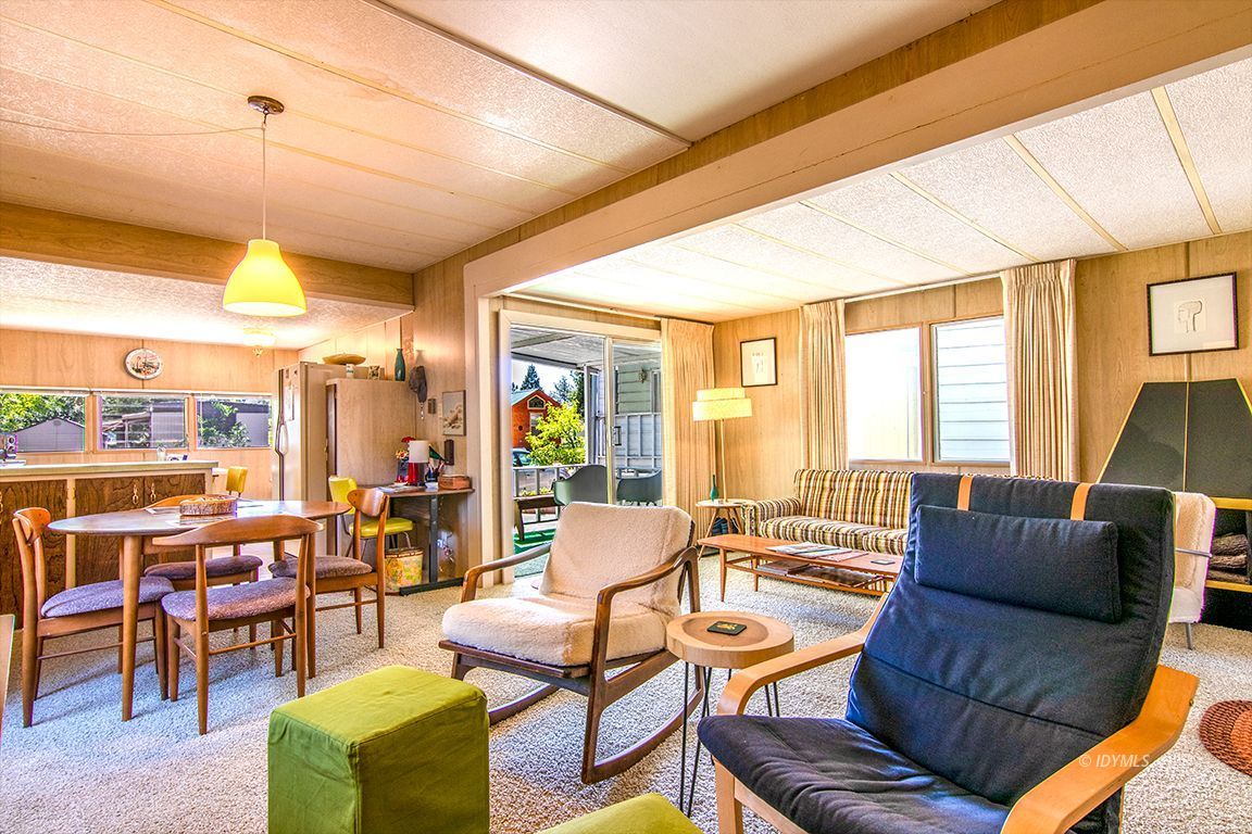 52901 Pine Cove Road, Unit 5 Idyllwild, CA 92549 - Photo 13 of 35 a living room with furniture and a large window