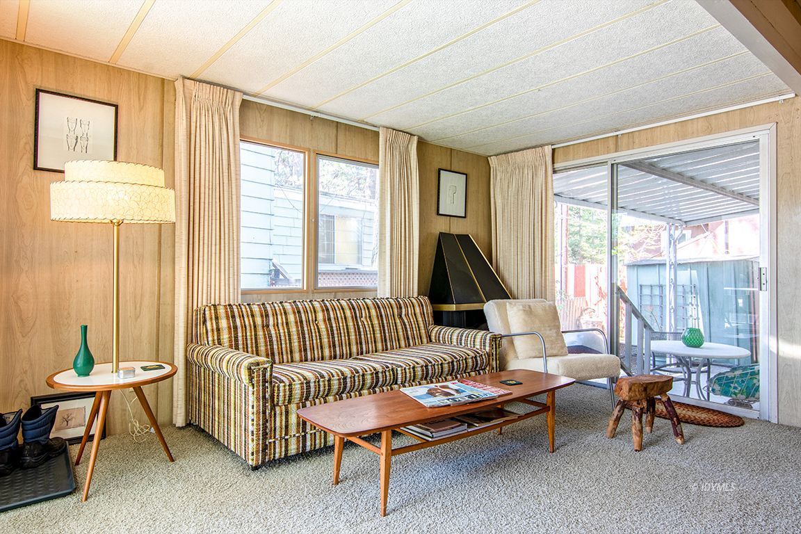 52901 Pine Cove Road, Unit 5 Idyllwild, CA 92549 - Photo 15 of 35 a living room with furniture and a window