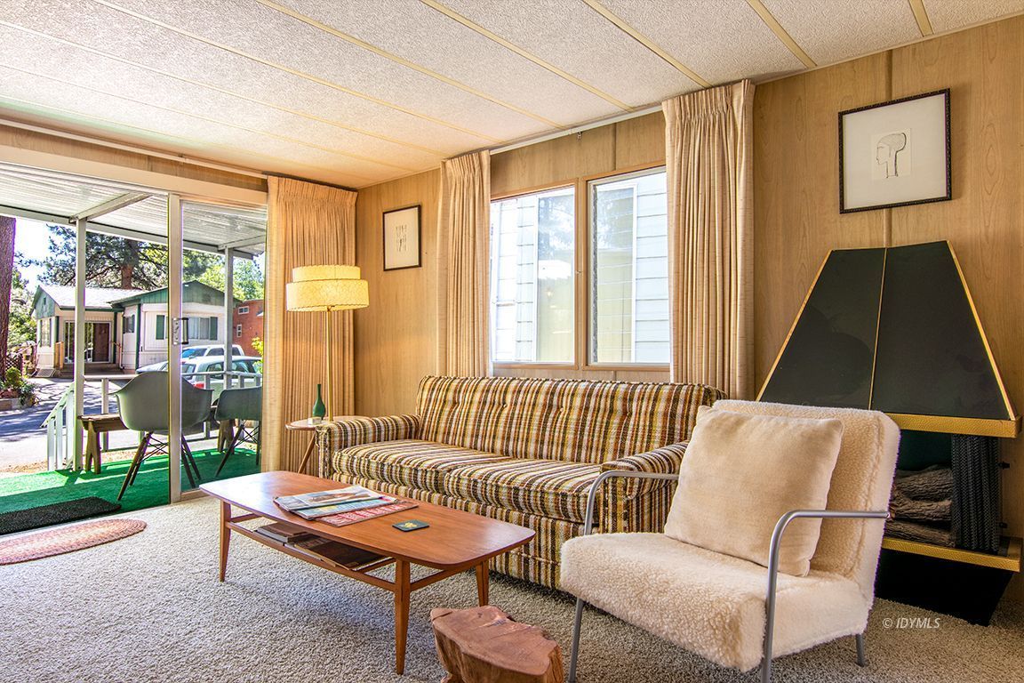 52901 Pine Cove Road, Unit 5 Idyllwild, CA 92549 - Photo 17 of 35 a living room with furniture and a window
