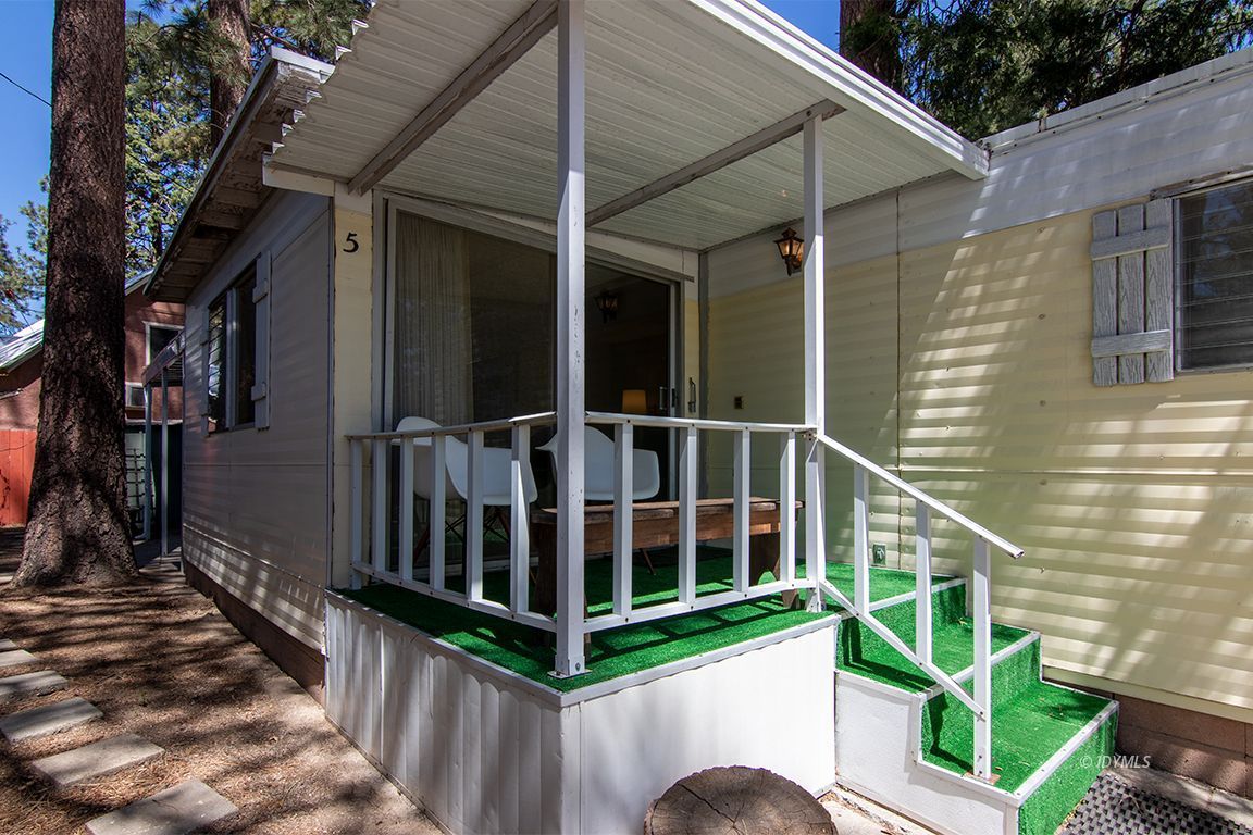 52901 Pine Cove Road, Unit 5 Idyllwild, CA 92549 - Photo 3 of 35 a view of a house with wooden stairs