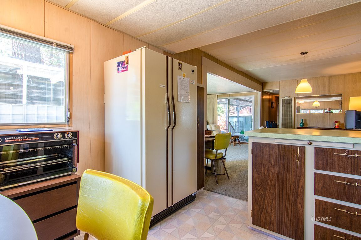 52901 Pine Cove Road, Unit 5 Idyllwild, CA 92549 - Photo 24 of 35 a view of kitchen with furniture and refrigerator