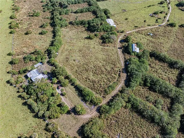 a view of a garden with a yard