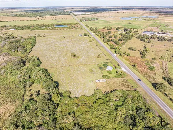 a house view with a backyard space