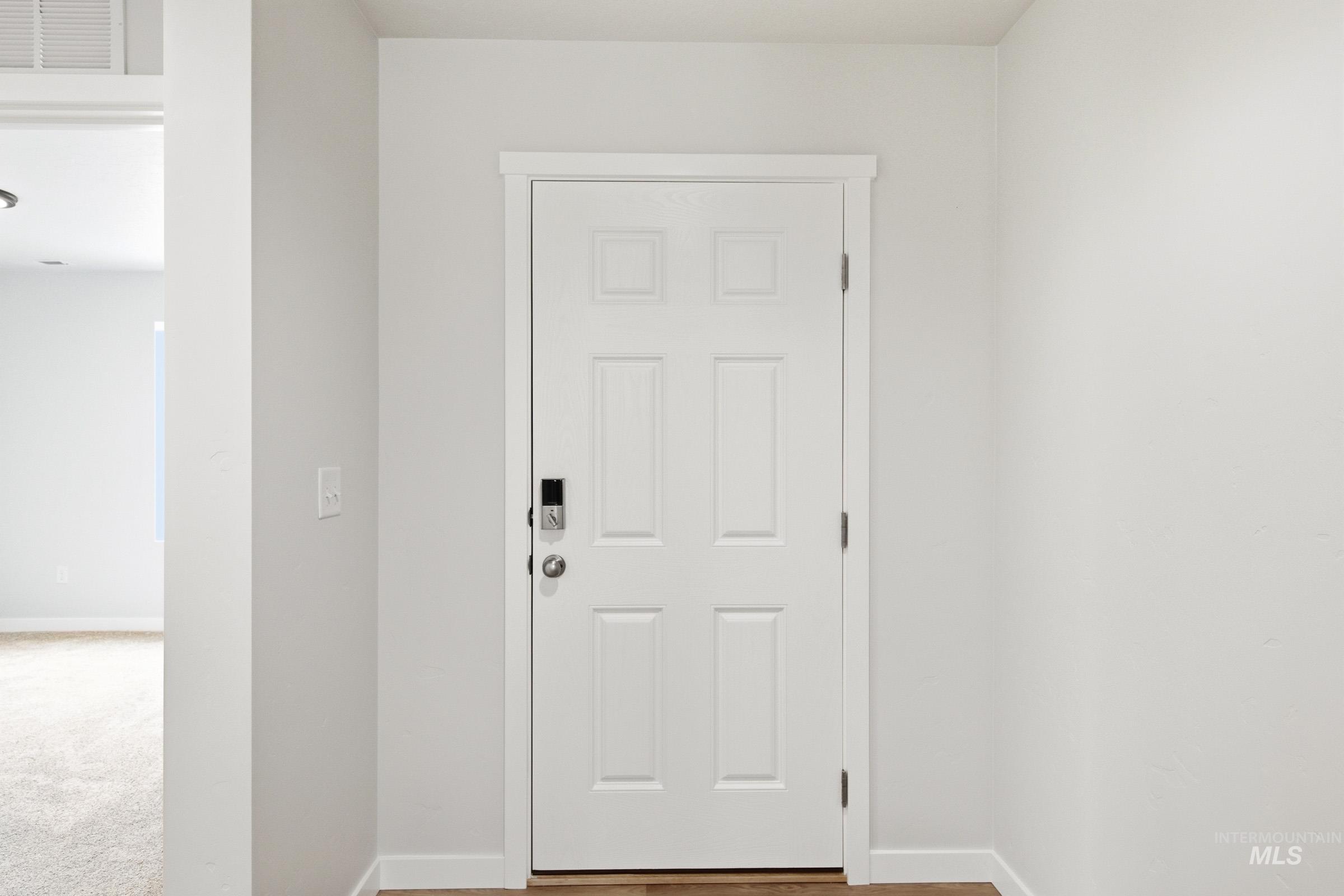 13735 Inman Court Caldwell, ID 83607 - Photo 2 of 20 Doorway featuring baseboards