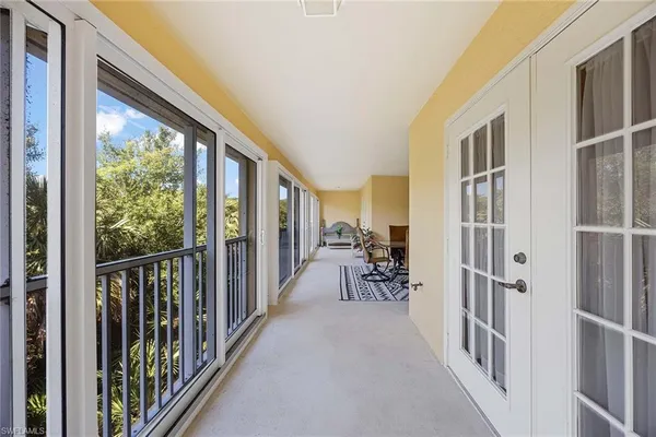 a view of a porch with furniture