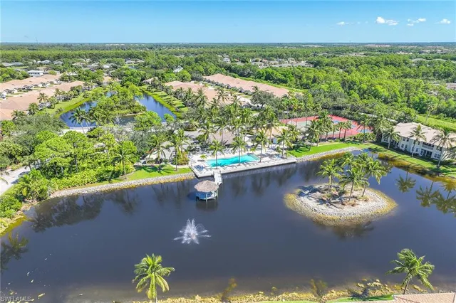 a view of a lake with a yard