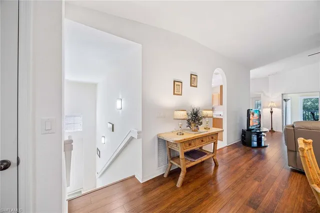a workspace with furniture and wooden floor