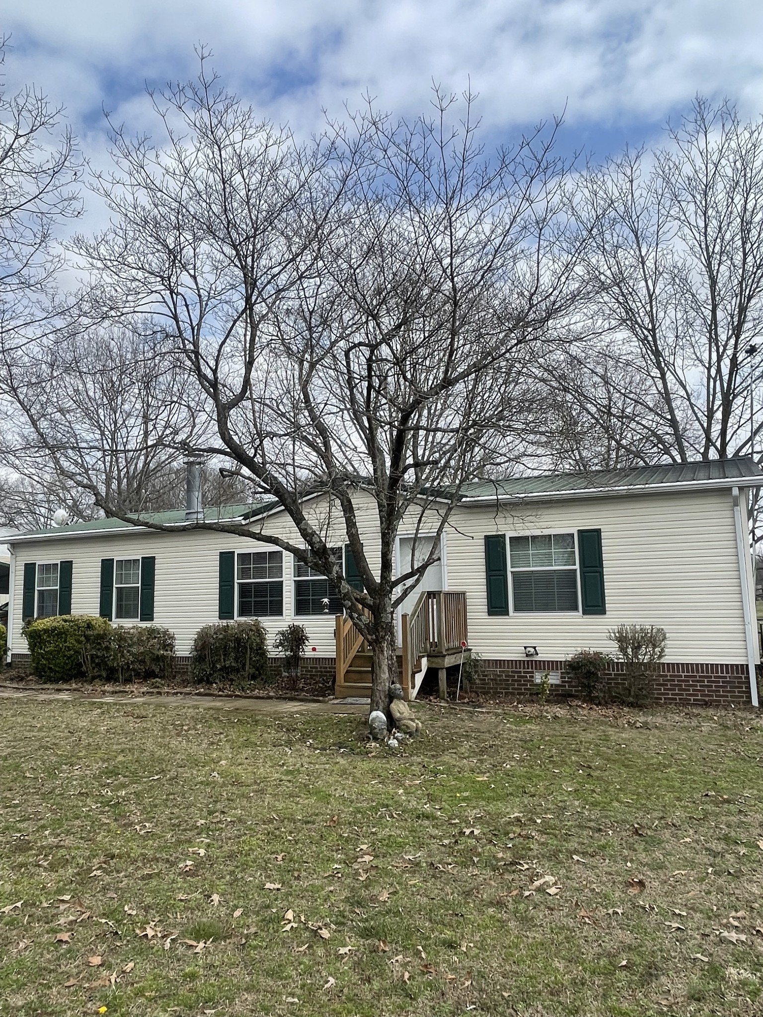 75 Snell Road Ethridge, TN 38456 - Photo 43 of 51 a front view of house with yard and trees around