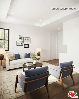 a living room with furniture and a rug