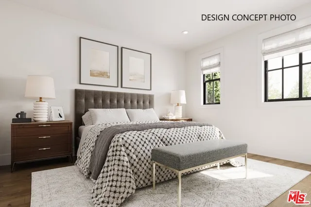 a bedroom with a bed and lamps