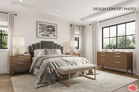 a bedroom with a bed and a cabinet