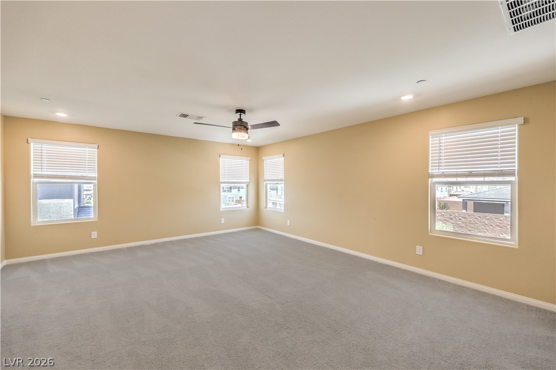 3782 Alla Rocca Avenue Henderson, NV 89044 - Photo 21 of 55 This spacious room features ample natural light and a soothing neutral palette, ready for your personal touch.