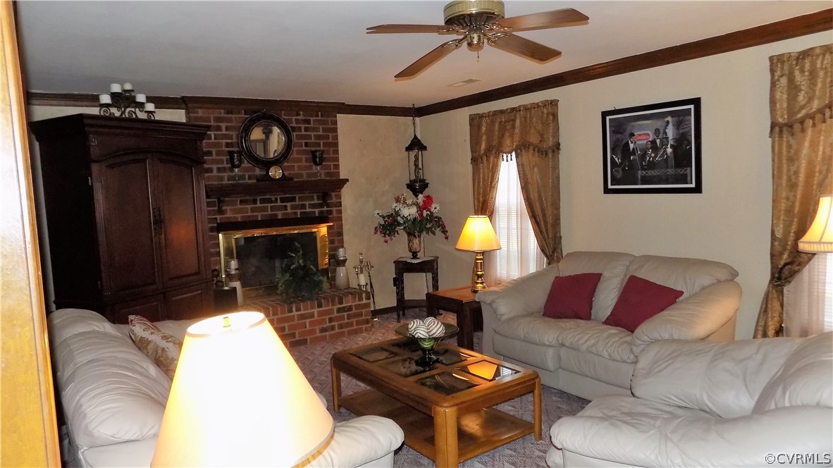 5330 Hopkins Road Richmond, VA 23234 - Photo 17 of 43 Paddle fan and crown molding in family room