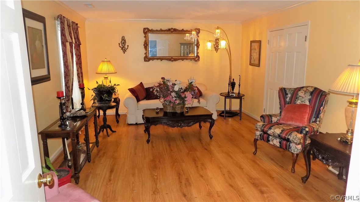 5330 Hopkins Road Richmond, VA 23234 - Photo 21 of 43 Living room with double door from foyer and dining