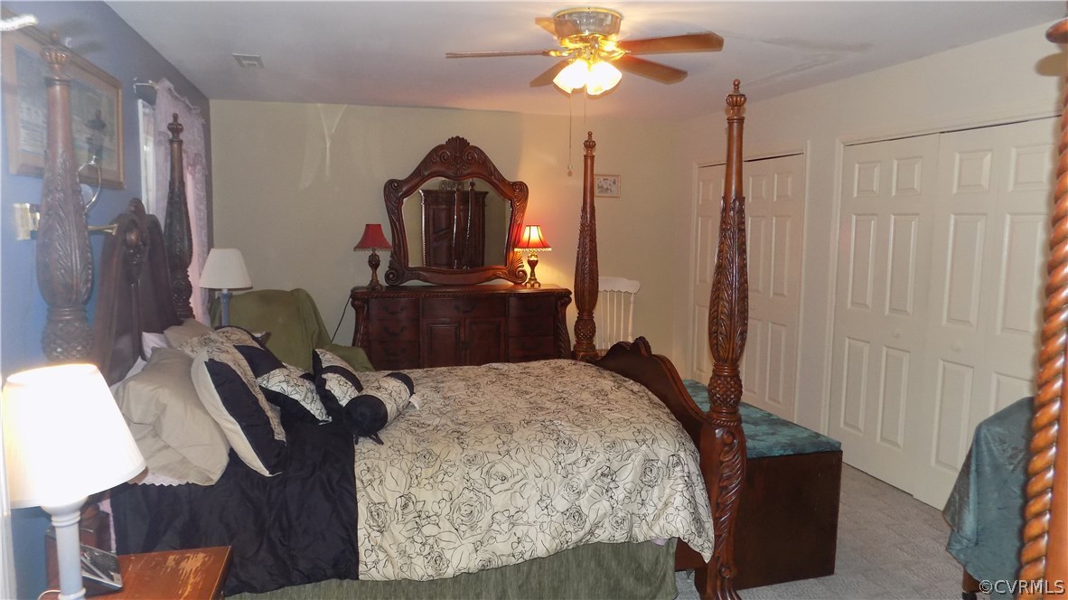 5330 Hopkins Road Richmond, VA 23234 - Photo 33 of 43 Master bedroom with double closets and paddle fan