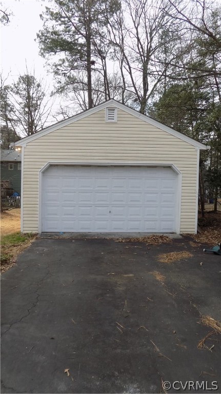 5330 Hopkins Road Richmond, VA 23234 - Photo 9 of 43 Two car garage with paved driveway