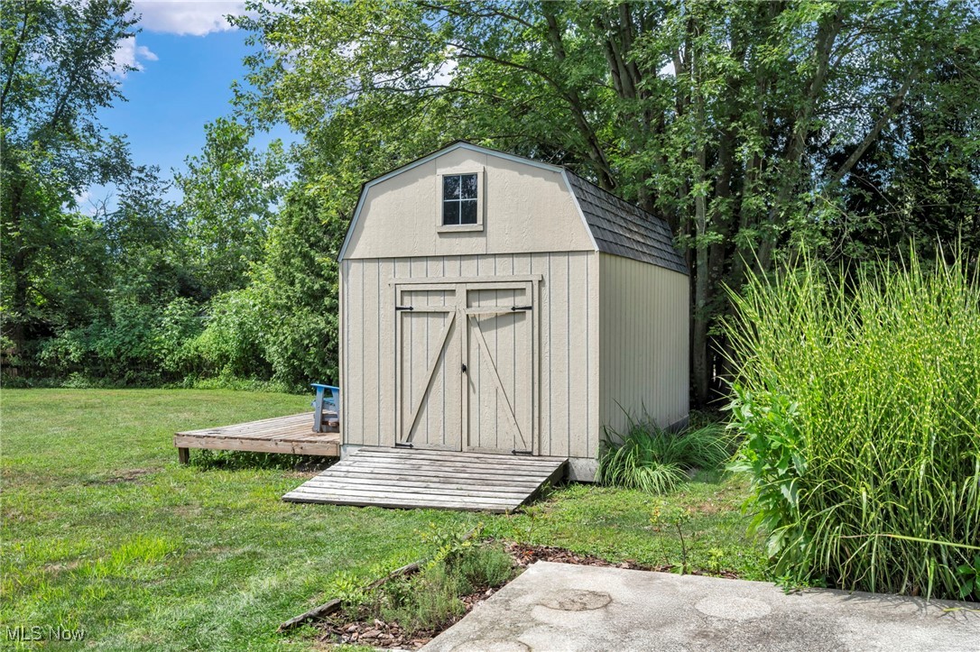 2264 Acre Road Akron, OH 44320 - Photo 38 of 47 View of shed featuring view of scattered trees