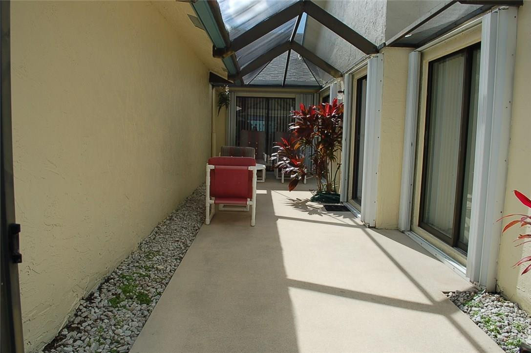 9123 Southwest 22nd Street, Unit D Boca Raton, FL 33428 - Photo 15 of 17 SCREENED IN PATIO