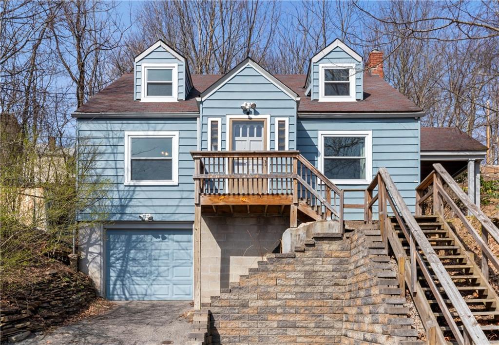 a front view of a house with a balcony